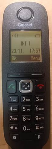 A black cell phone with a screen

Description automatically generated